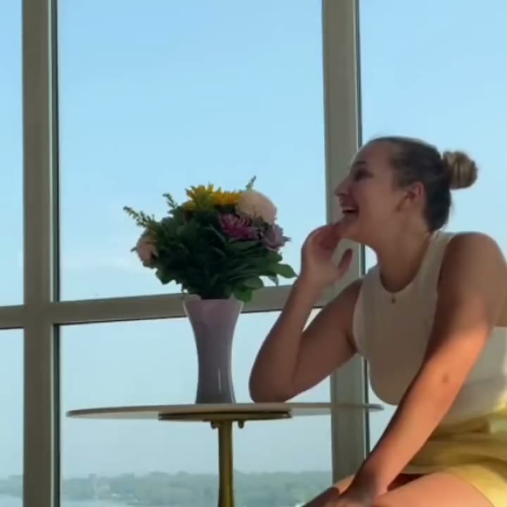 Real couple reaction moment while listening to a personalized love song gift